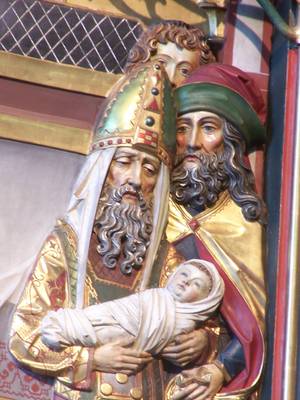 Das Bild zeigt den greisen Simeon mit Jesus im Arm